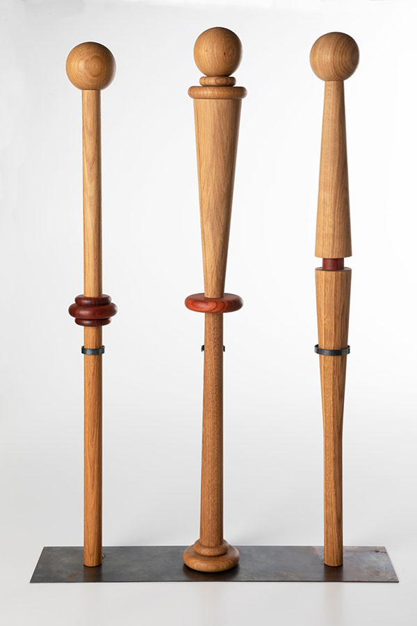 Three wood walking sticks